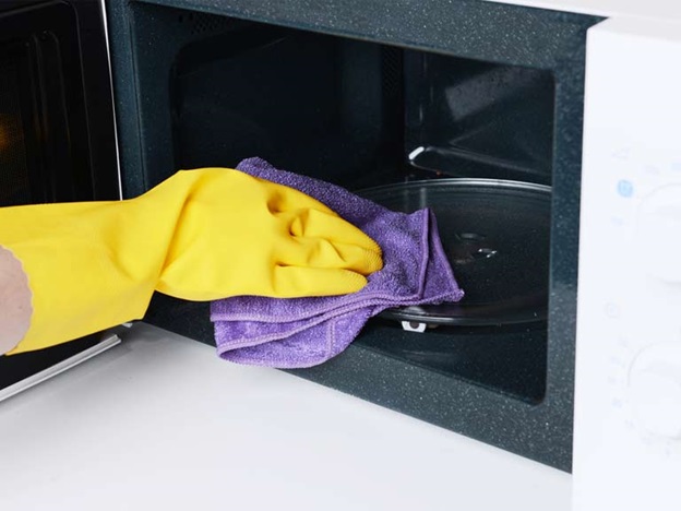 Connect the microwave under a wall cabinet or shelf