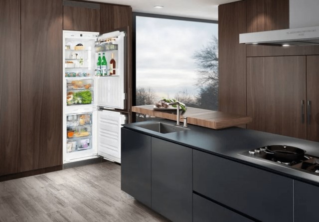 What is the difference between a built-in refrigerator and a regular refrigerator?