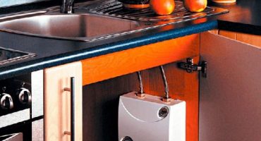 How is a boiler different from a water heater and what is better