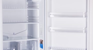 What is a refrigerator drier defrost system